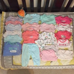 19 onesies, 2 pants and 1 cap Lot